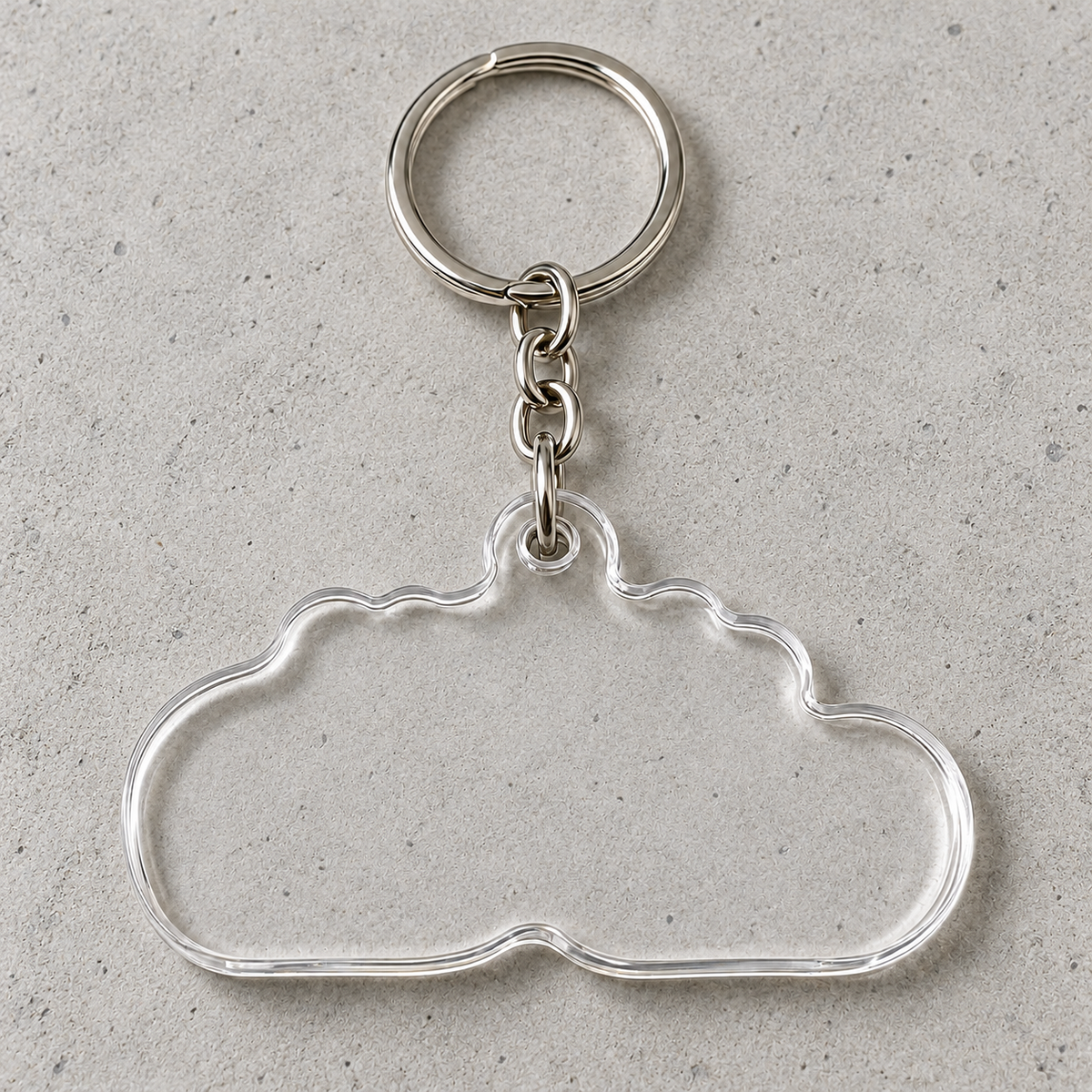 Porte-clés personnalisable sur plancher de béton — face